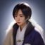 心理咨询师陈明远，从事成人心理健康与媒介素养研究，穿着正装在咨询室内